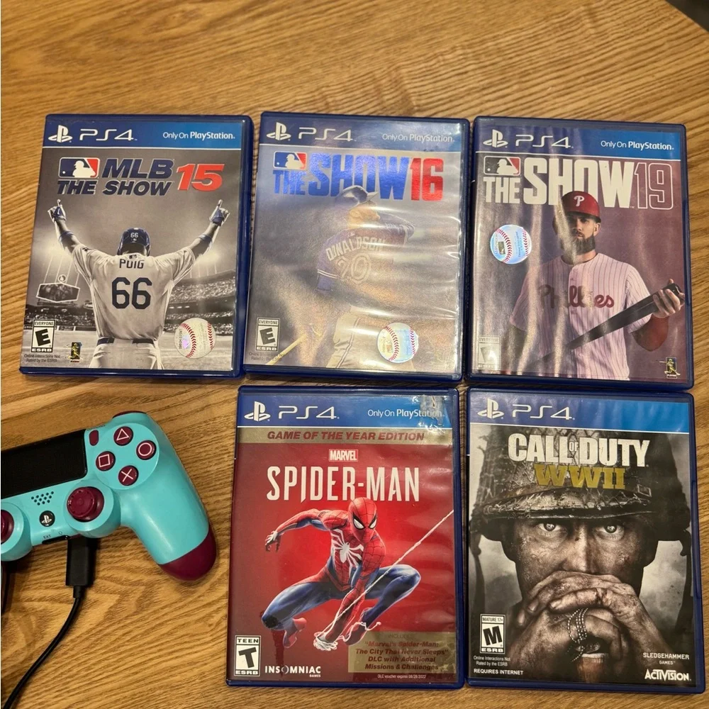 Sony PlayStation 4 Console with Black Keyboard and 5 Games